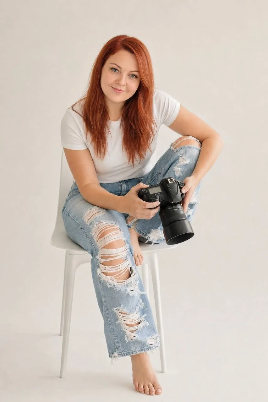Tanya Taskiran, Greater Vancouver photographer and videographer, holding her camera